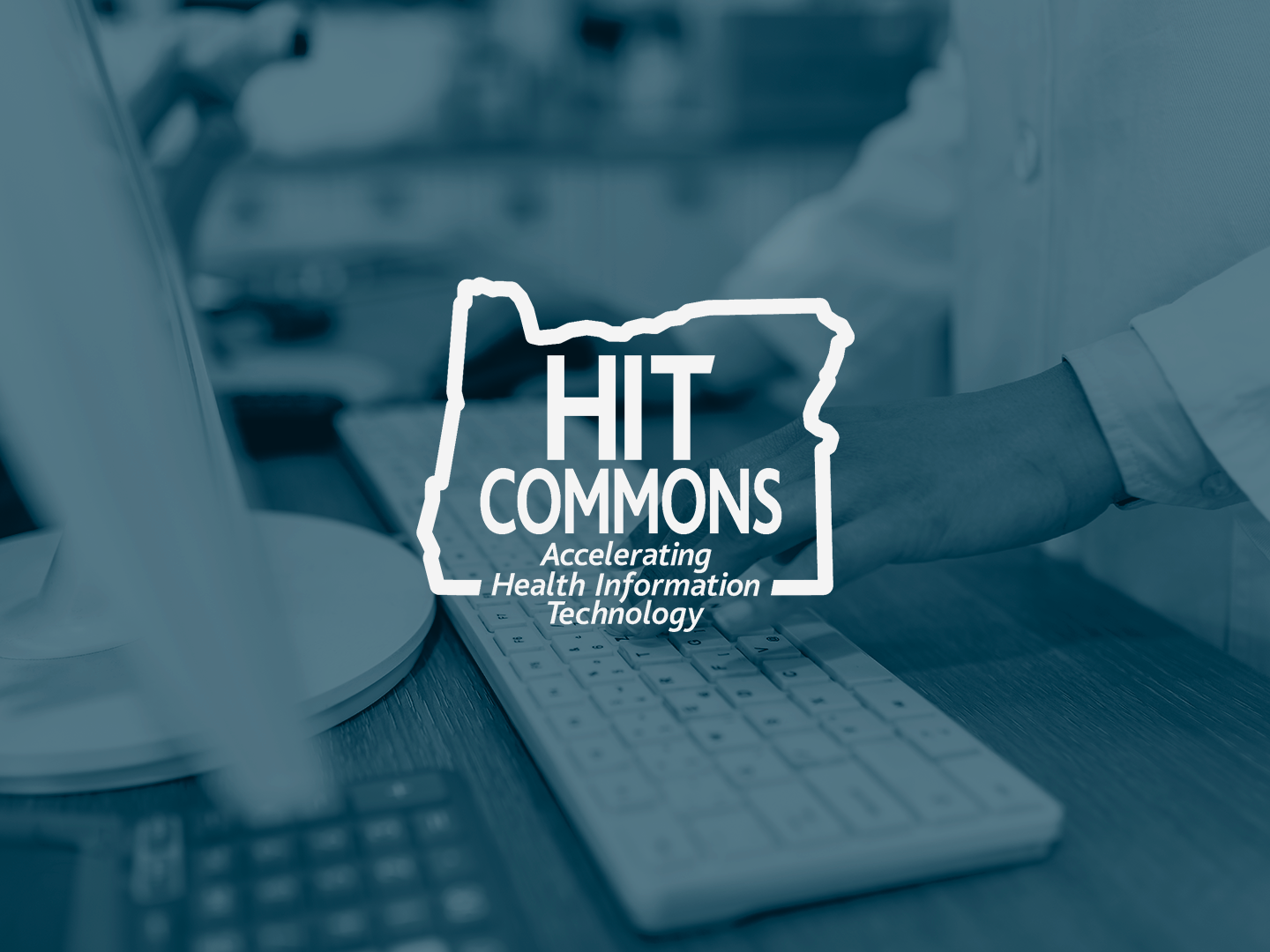 HIT Commons logo with person at keyboard as background.